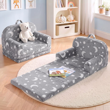 Keezi 2-in-1 kids' fold-out sofa bed in grey with removable washable cover, glow-in-the-dark feature, carry handle, and storage pocket.