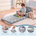 Keezi kids 2-in-1 fold-out sofa bed in grey with removable washable cover, carry handle, storage pocket, and glow-in-the-dark features