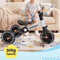White RIGO tricycle bike for kids with 3 wheels, made from carbon steel, designed for young children and outdoor play.