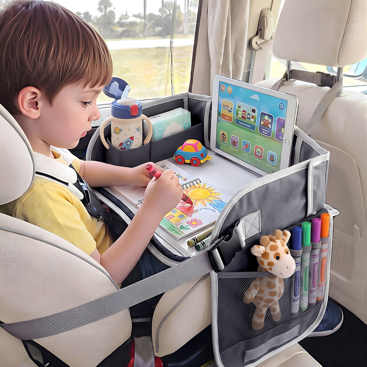 Grey Keezi Kids Travel Tray, portable car seat lap desk with organizer for kids, suitable for car and airplane travel.