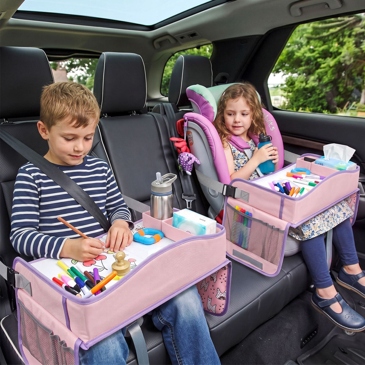 Pink Keezi kids travel tray car seat lap desk, portable organizer for car and airplane, designed for kids’ comfort and convenience.