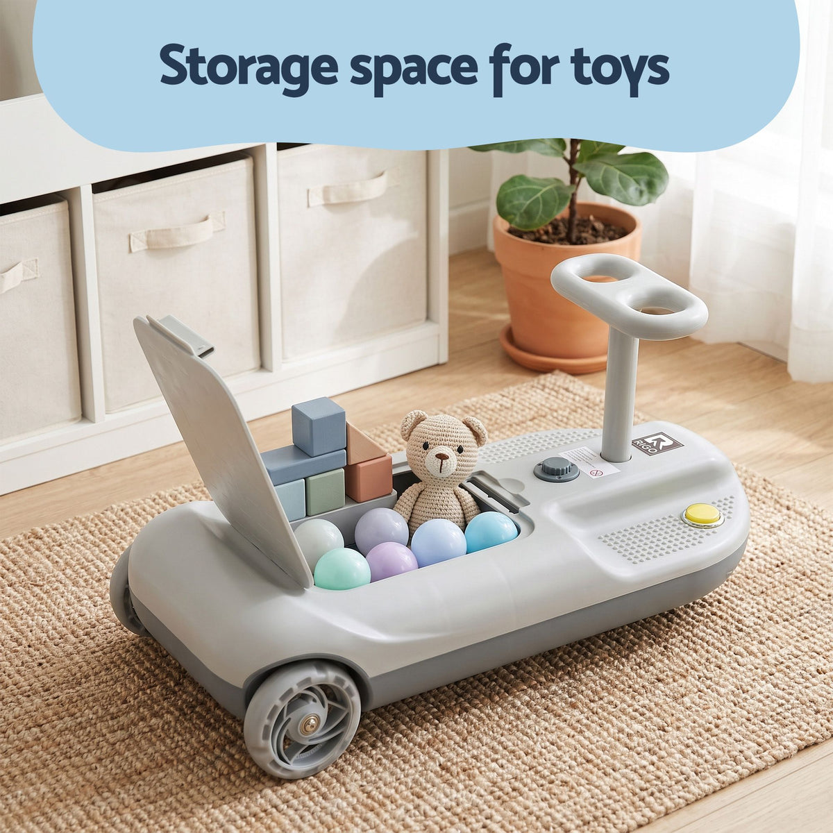 Grey Rigo ride-on car for kids with mop storage, 12V battery, 86cm length, by Everything Baby, designed for young children.