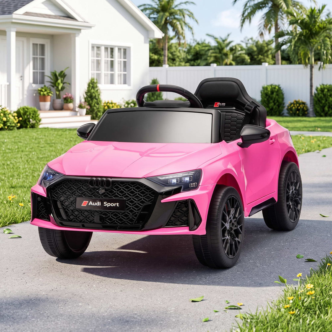 Pink licensed Audi RS3 ride-on car for kids with remote control, 12V battery, branded Everything Baby, suitable for young children.