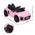 Pink Audi R8 ride-on car for kids, 12V electric battery-powered toy vehicle with realistic design and branding by Everything Baby.