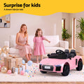 Pink licensed Audi R8 12V electric ride-on car for kids, featuring realistic design and battery-powered operation by Everything Baby.