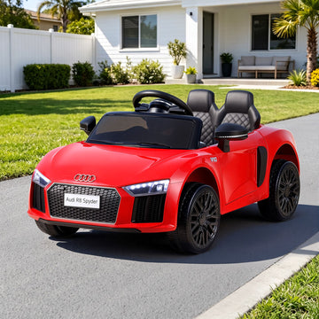 Red licensed Audi R8 12V electric ride-on car for kids by Everything Baby, showing the detailed front view with steering wheel.