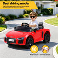 Red Audi R8 ride-on electric car for kids by Everything Baby, featuring realistic design and 12V battery for young drivers.
