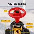 Kids riding a red Rigo 12V electric train car toy for children, featuring a two-seater design and realistic train details.