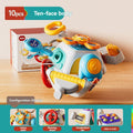 Baby hand grasping colorful polyhedron activity toy with ten sides, designed for sensory play and fine motor skills development.