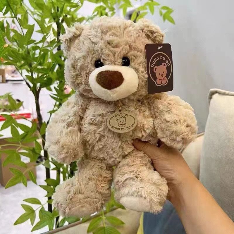 Dark brown plush teddy bear, 20cm huggable toy for kids, soft stuffed animal, perfect as a gift or claw machine prize.