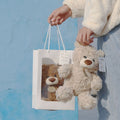 Light brown plush teddy bear, 25cm huggable toy for kids, cuddly stuffed animal, ideal as a gift or claw machine prize.