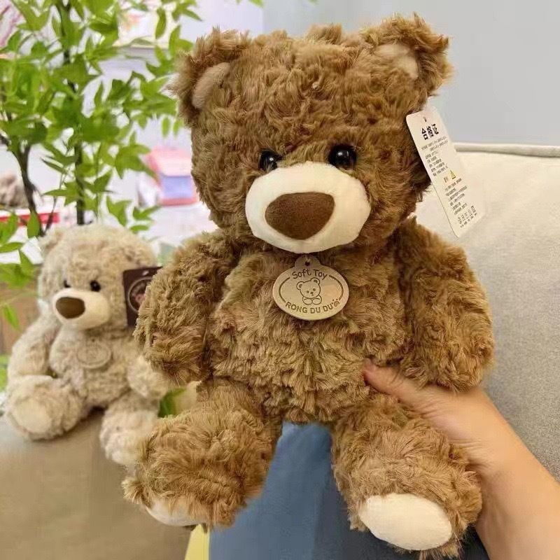 Light brown plush teddy bear, 25cm cuddly toy for kids, soft stuffed animal, perfect as a birthday gift or claw machine prize.