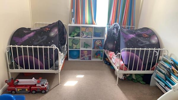 Space-themed kids' bed tent by Everything Baby, featuring cosmic designs for outdoor play and cozy hideaway.
