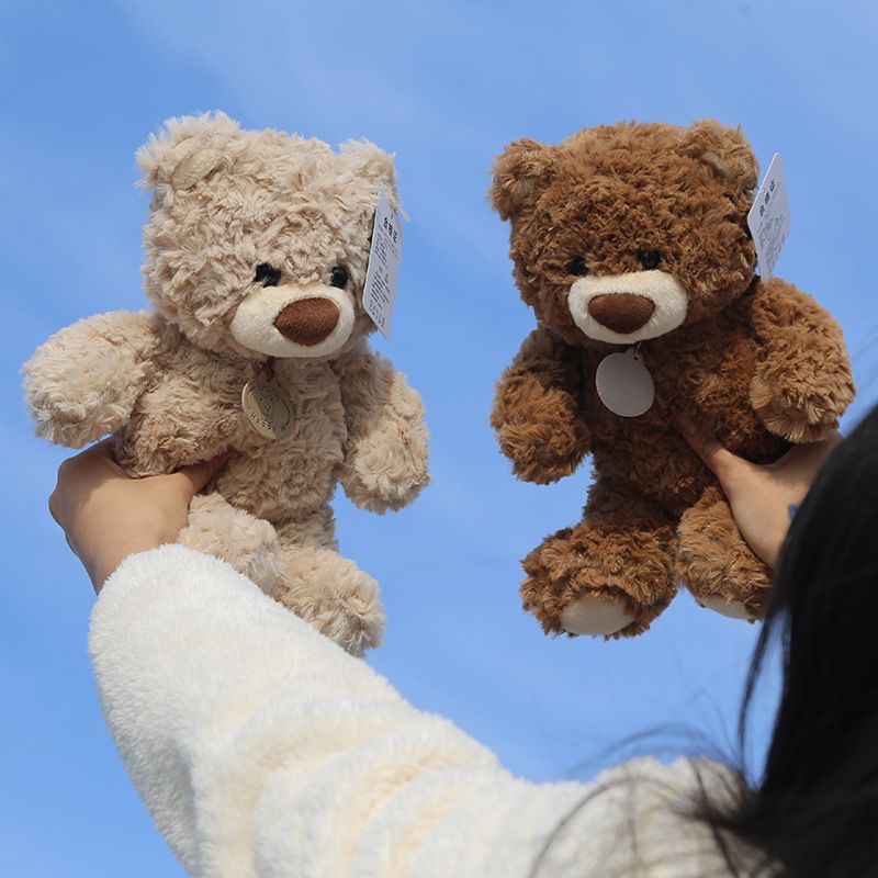 Dark brown plush teddy bear, 25cm huggable toy, soft doll for kids, perfect birthday gift, Australian-made stuffed animal.