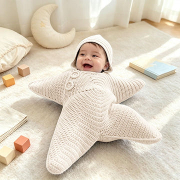Cute white baby starfish onesie with snowman and Santa designs, soft fleece fabric, ideal for Christmas and holiday wear for newborns.