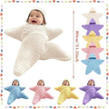 White baby starfish onesie with snowman and Santa crochet designs, soft fleece fabric, ideal for Christmas and holiday wear.