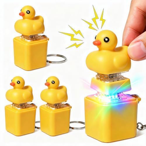 Four duck-themed button keychains with LED lights, fidget toys for stress relief, portable animal sensory toys for kids and office use.