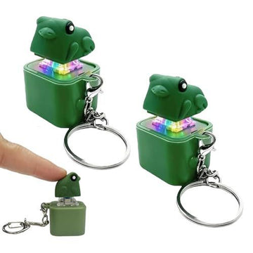 Four frog croaking keychains with LED lights, rechargeable and sensory toys for stress relief, suitable for adults and kids.