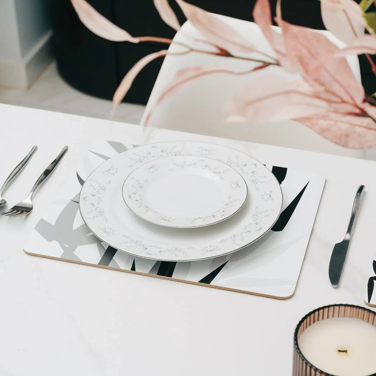 Set of four bamboo Clevinger MD placemats designed for kids, featuring colorful, child-friendly building toy patterns.