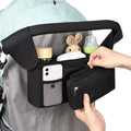 Universal stroller organizer by Everything Baby with insulated cup holders, detachable phone pocket, and large storage in black.