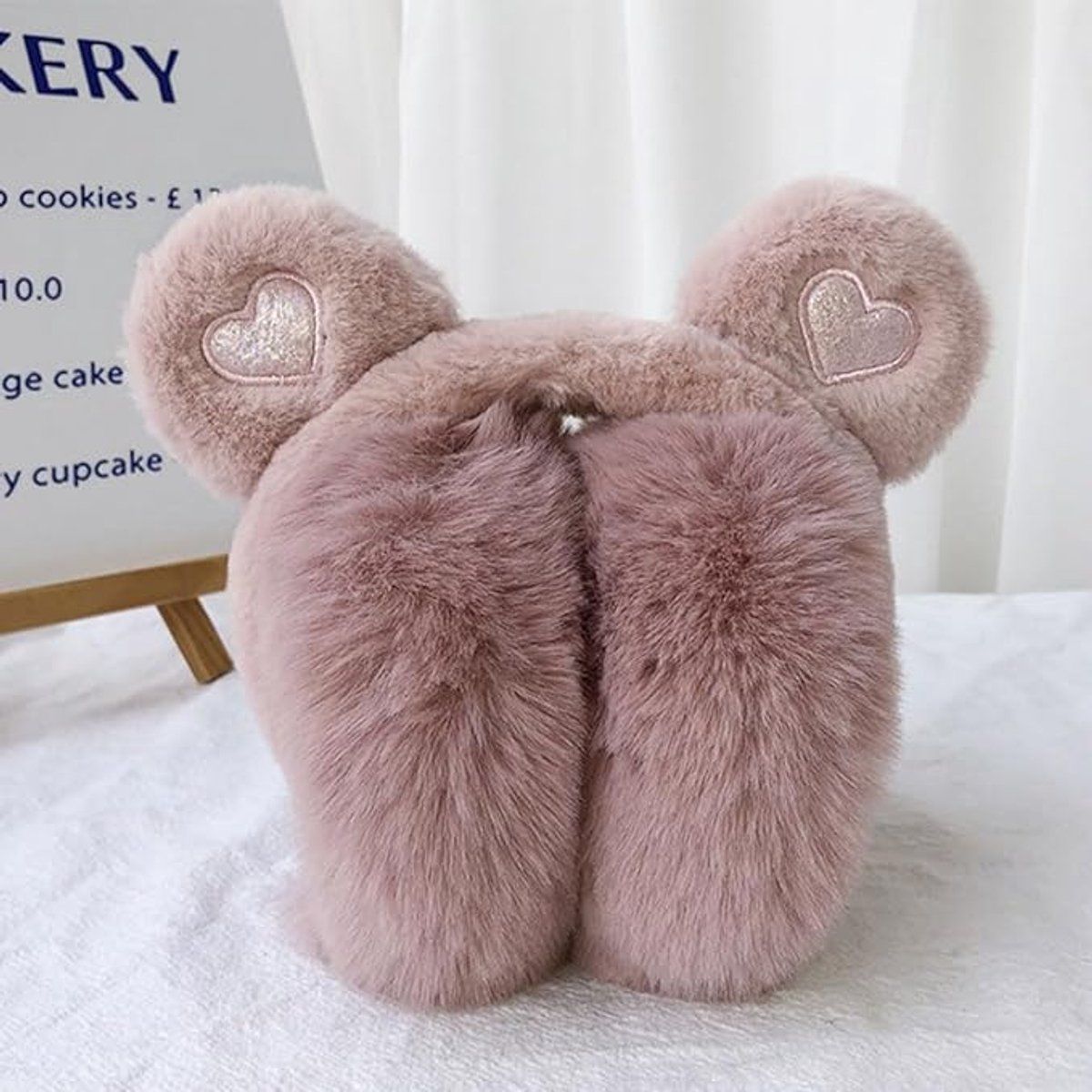 Soft thermal earmuffs for girls by Everything Baby, featuring bear ears, ideal for cold weather, travel, and winter wear for kids.