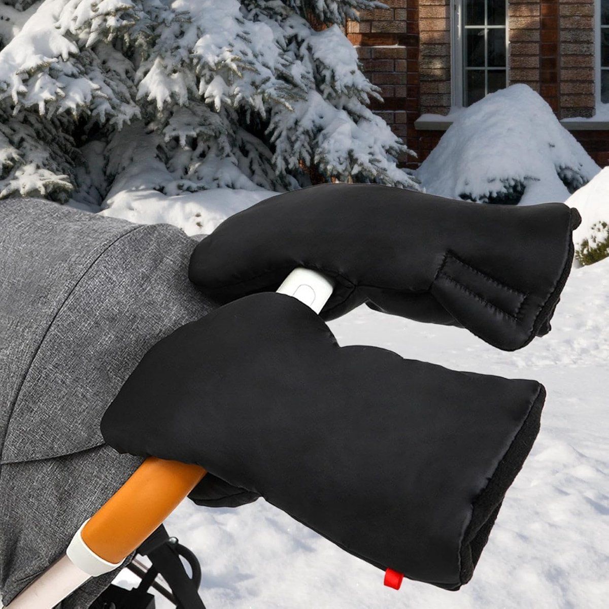 Black foldable stroller hand warmer and gloves from Everything Baby, adjustable anti-freeze stroller accessories for cold weather.