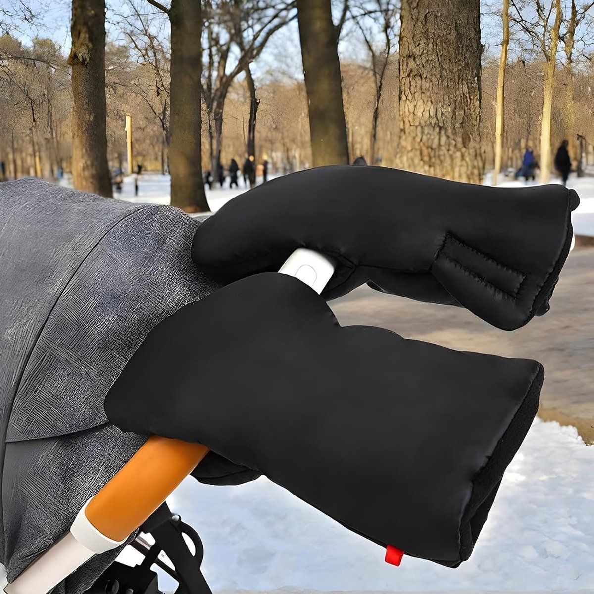 Black foldable stroller hand warmer gloves from Everything Baby, adjustable anti-freeze gloves for cold weather stroller accessories.
