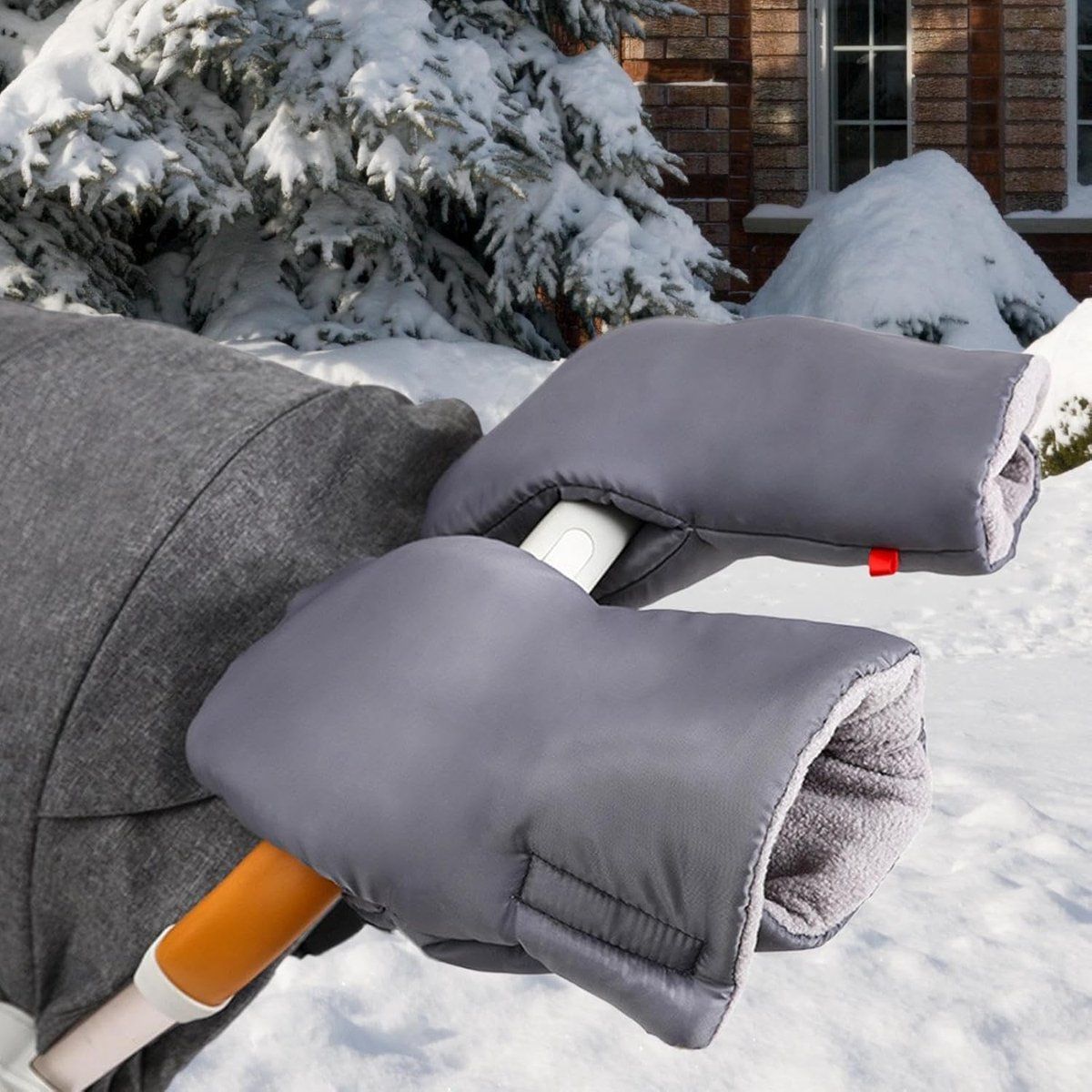 Grey foldable stroller hand warmer and gloves by Everything Baby, adjustable anti-freeze stroller accessories for cold weather.