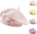 Pink girls' knitted winter beret hat for toddlers, cute floral design, warm French-style baby and kids winter headwear.