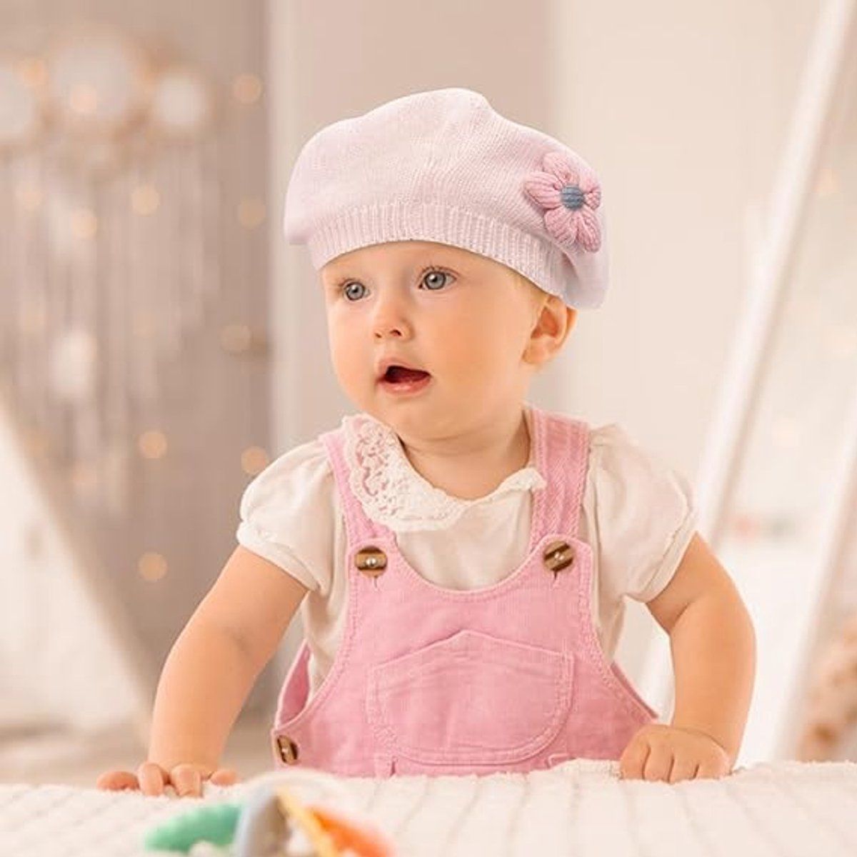 Pink girls' winter knitted beret hat for toddlers, cute floral design, warm and cozy for cold weather, perfect for daily wear and travel.