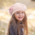 Pink girls' knitted winter beret for toddlers, warm floral baby hat by Everything Baby, perfect for cold weather and daily wear.