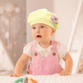 Yellow girls' toddler winter beret by Everything Baby, cozy knitted floral hat for cold weather, travel, and daily winter wear.