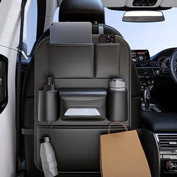 Black car seat organizer for children with multiple pockets and iPad holder, designed for backseat storage and easy access.