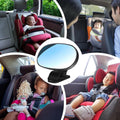 Black baby car mirror for rear-facing seats, 360-degree adjustable interior safety mirror showing clear backseat view.