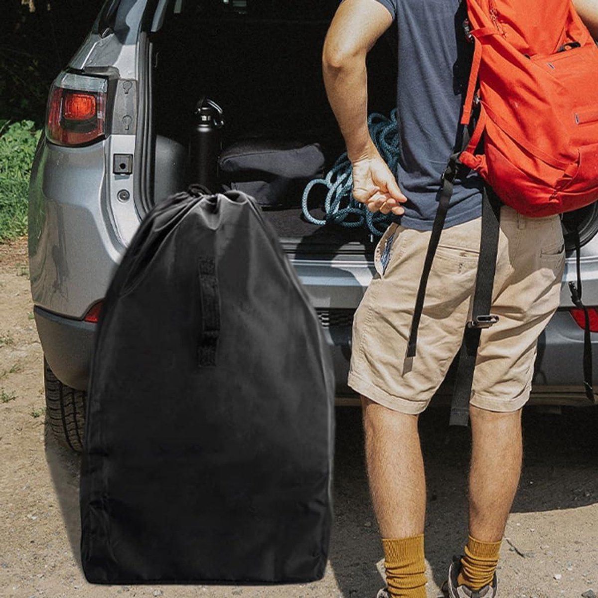 Black travel bag for car seats and strollers by Everything Baby, waterproof transport bag with shoulder strap for easy air travel.