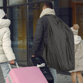 Black baby travel bag for car seat and stroller with shoulder strap, waterproof, convenient for air travel, 86x43 cm.