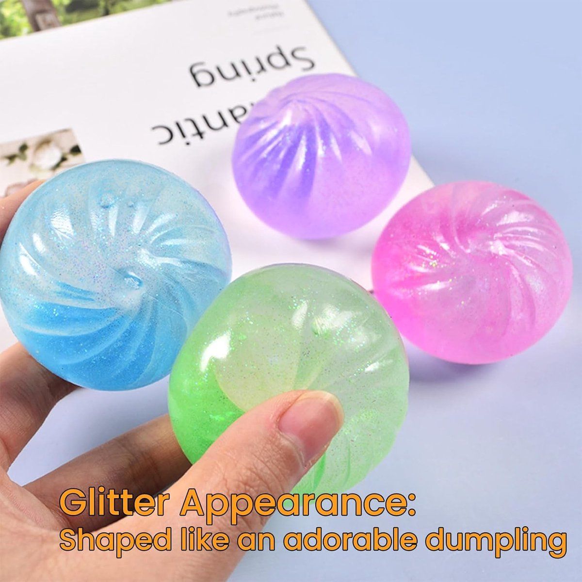 Four giant sparkling crystal dumpling squishies, colorful sensory fidget toys for anxiety relief and decompression, by Everything Baby.
