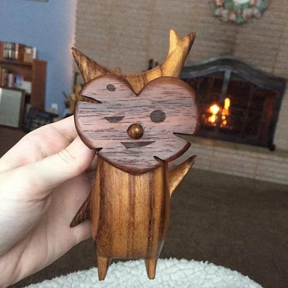 Three cute anime-style wood and resin family game lovers statues for kids' room or gaming room decor.
