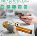 Wireless Bluetooth karaoke microphone for kids in gold, portable handheld mic with speaker, recorder, and fun outdoor play features.
