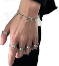 Gothic punk chain tassel bracelet with slave finger rings and hand chain for women and girls, featuring metal chain details.
