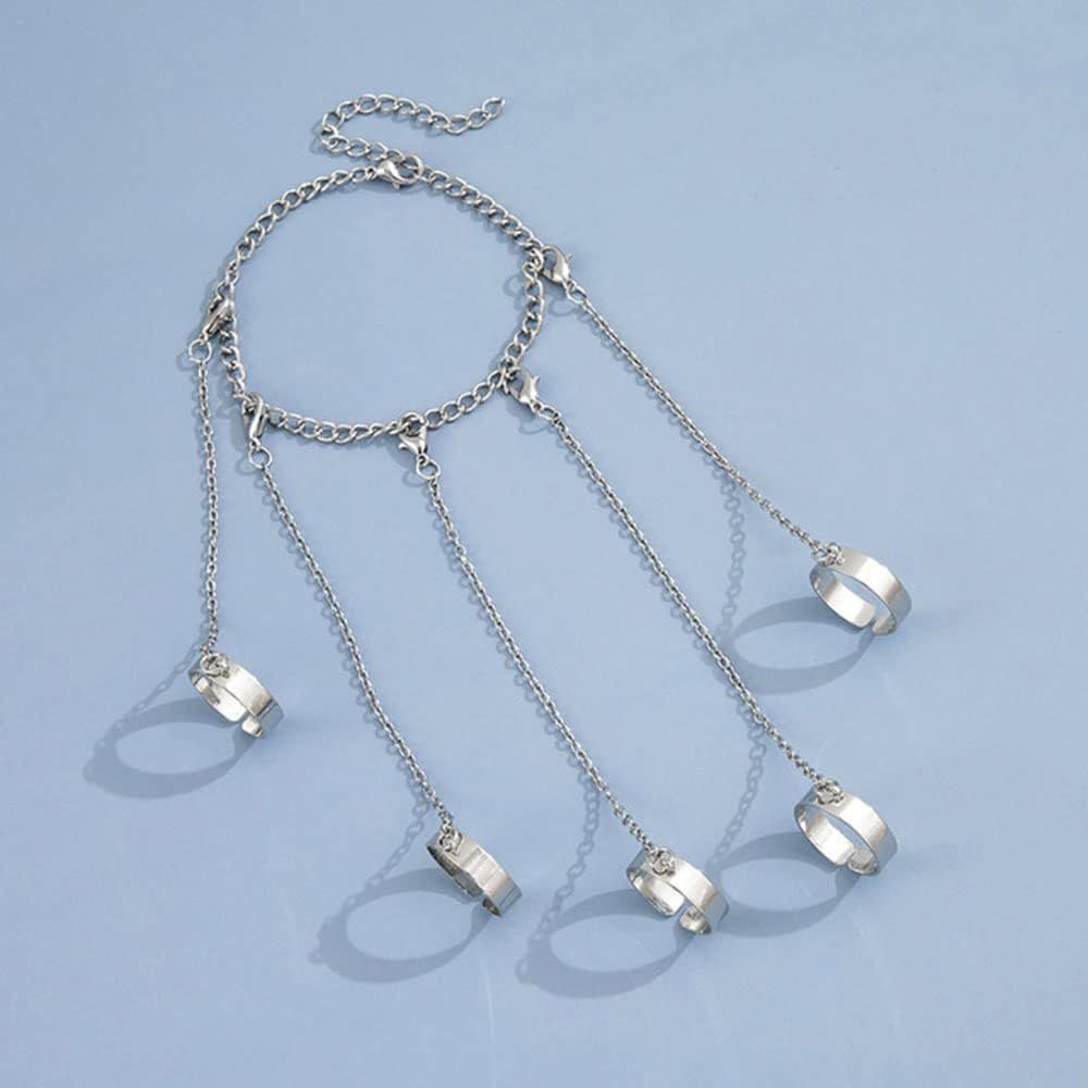 Silver punk chain tassel bracelet with slave finger rings and gothic hand chain, styled for women and girls.