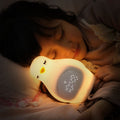 Cute kids alarm clock with soft BPA-free silicone nursery lamp, portable nightlight for girls and boys, toddler bedtime toy.