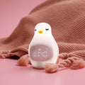 Cute kids alarm clock with soft BPA-free silicone nursery lamp, portable nightlight for children, ideal for toddlers and preschoolers.