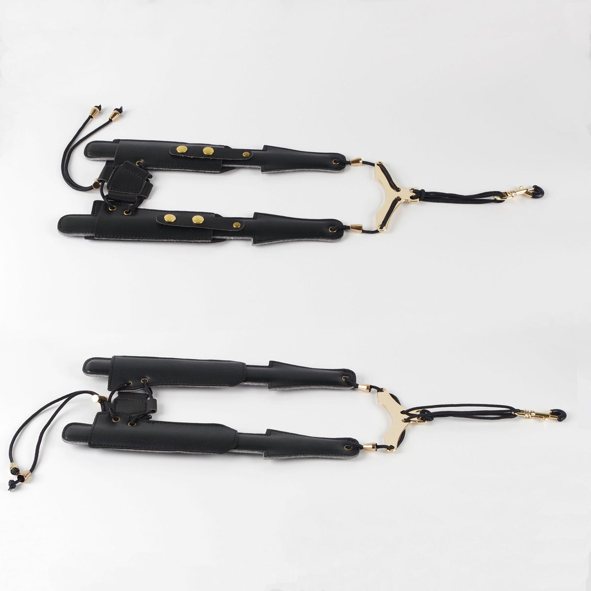 Leather saxophone strap with gold snap and adjustable feature, designed for saxophone players, suitable for musical toy display