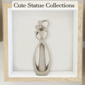Handmade sandstone Kiss Lovers couple statue with abstract design, suitable for outdoor garden or art decor display.