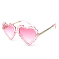 Girl heart-shaped sunglasses by Everything Baby, cute UV protection glasses for toddlers, ideal for outdoor parties and beach days.