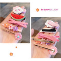 Set of 24 colorful baby girl hair clips with rainbow, flower, fruit, and dessert patterns, featuring cute barrettes for kids.