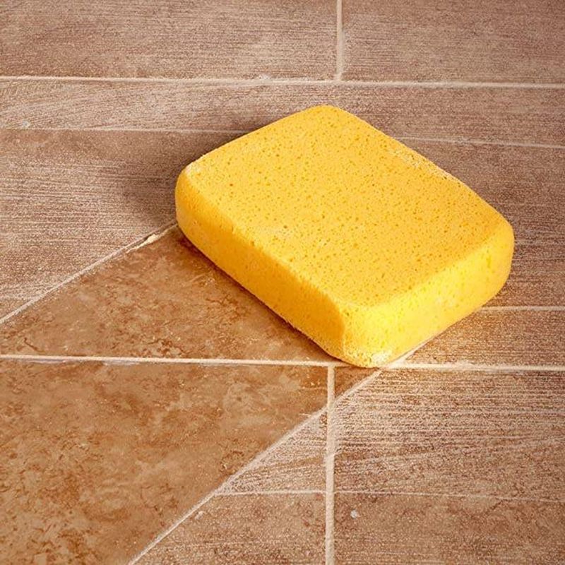 Yellow extra large baby grooming sponge for cleaning and washing, part of Everything Baby nursing and health kit.