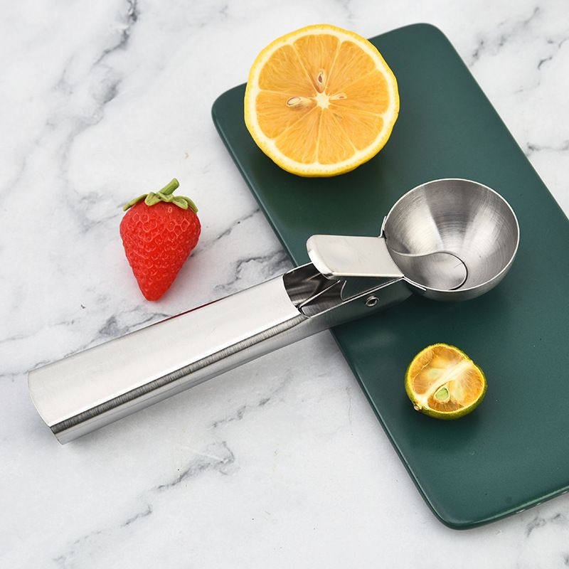 Heavy-duty stainless steel ice cream scoop with trigger, ideal for fruit and dessert servings, from Everything Baby.