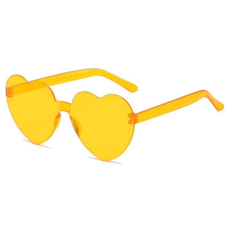 Multicolor heart-shaped sunglasses for girls and women, frameless transparent glasses with playful heart designs, perfect for parties.